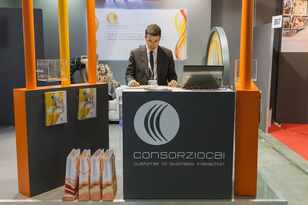 Exhibitor in his stand at Smau 2014 in Milan, Italy
