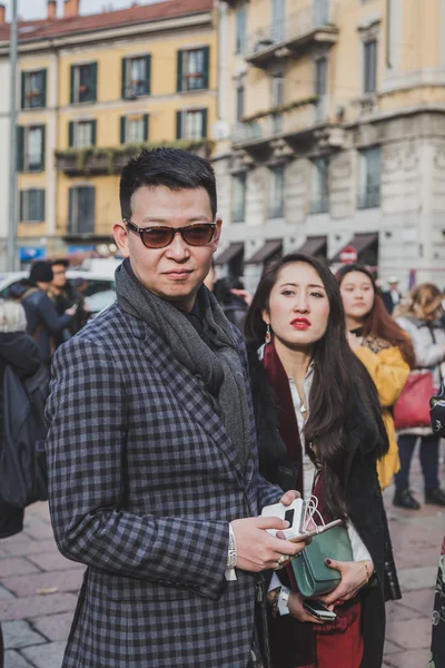 People outside Gucci fashion show building for Milan Men\'s Fashion Week 2015