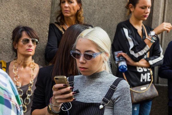 People gather outside Scervino fashion show building in Milan, I