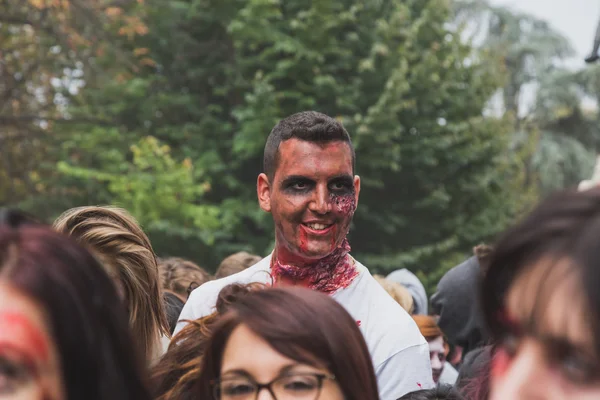 People take part in the Zombie Walk in Milan, Italy