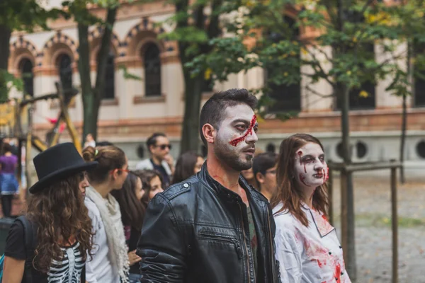 People take part in the Zombie Walk 2015 in Milan, Italy