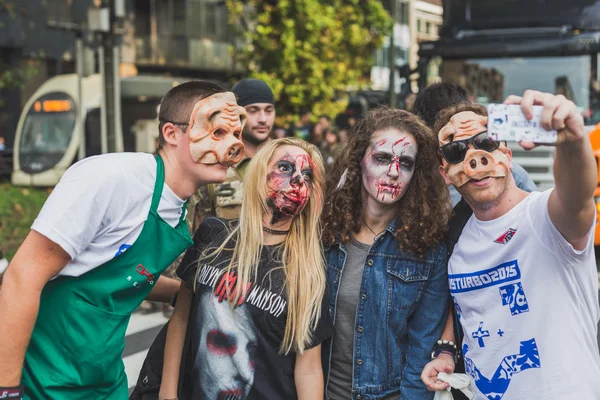 People take part in the Zombie Walk 2015 in Milan, Italy