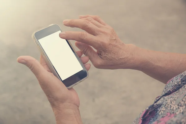 Woman elderly Using a Smart Phone.