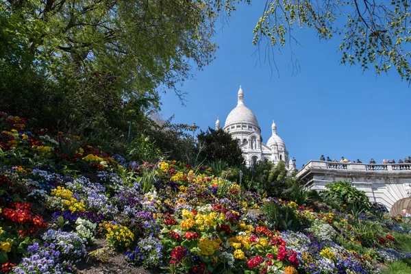 PARIS, FRANCE - MAY 1 2016 - Montmartre stairway crowded of people for sunday sunny day