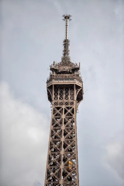 PARIS, FRANCE - MAY 2, 2016: Tourist taking pictures at Tour Eiffel town symbol