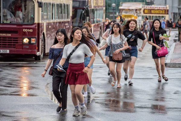 WASHINGTON D.C., USA - JUNE, 21 2016 - Asian girls runnign outside Union Station