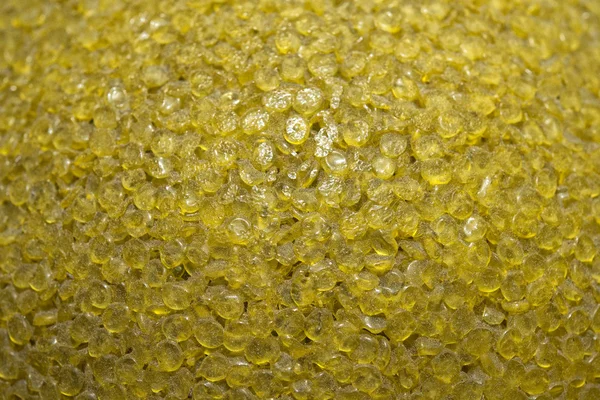 Yellow plastic grains texture