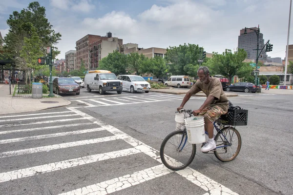 NEW YORK, USA - JUNE 15, 2015 - People walking in Harlem on weekday