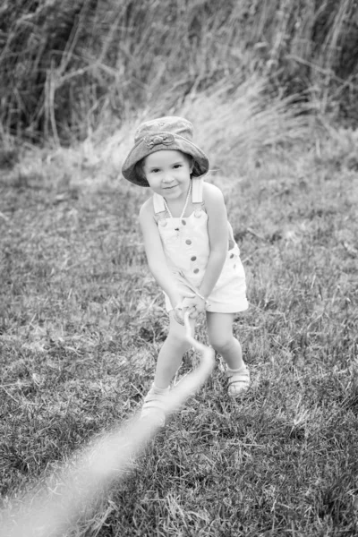 Happy little girl playing