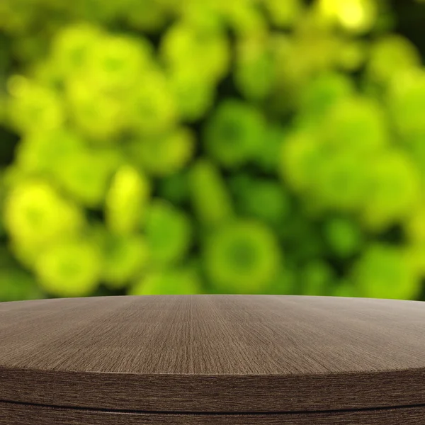 Empty wooden round table and blurred background for product pres