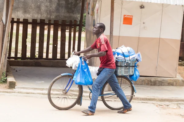 A street seller of plastic bags