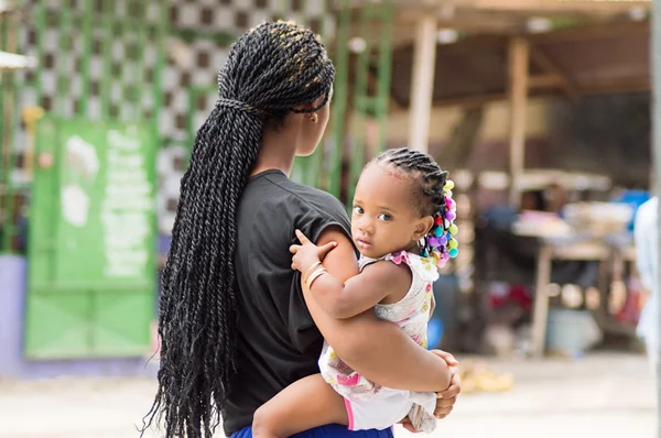 Young woman with her baby