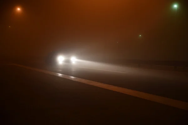Night scene on the road with fog