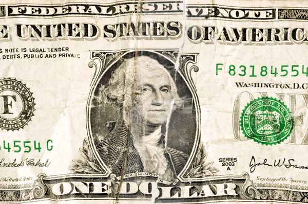 Badly Torn And Repaired Dollar Bill