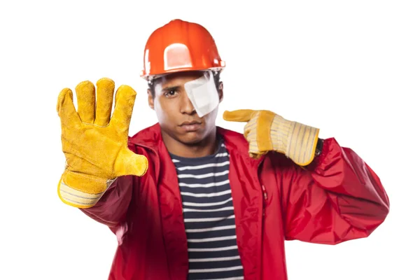 Worker with injured eye