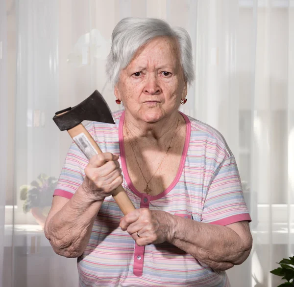 Angry old woman with an ax