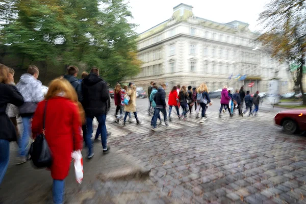 People crossing the street on the zebra crossing