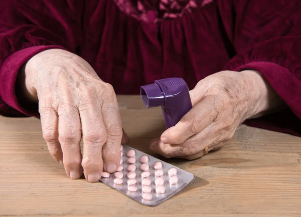 Old woman going to take the medicine