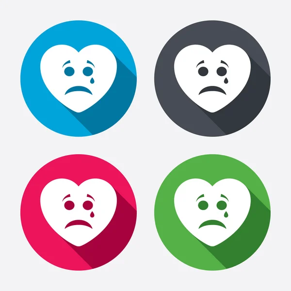 Sad heart face with tear icons