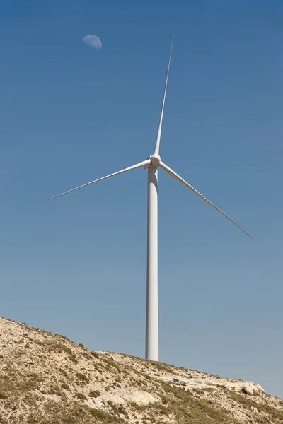 Wind turbine and the moon. Clean alternative renewable energy
