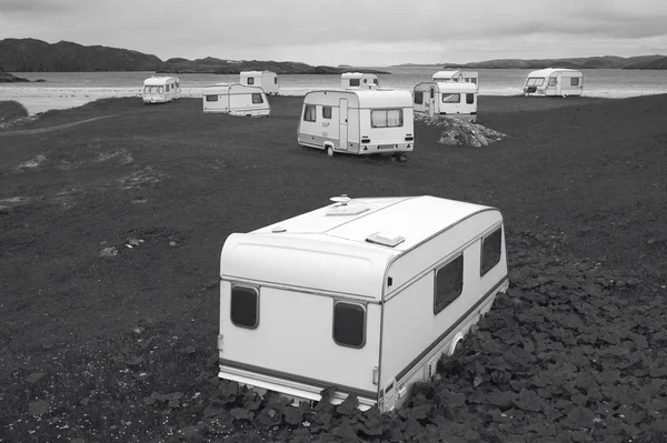 Camper vans parked on a beach. Scotland. UK
