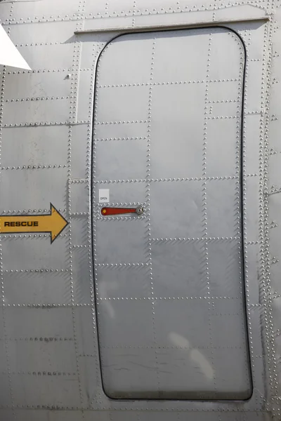 Metallic aircraft emergency and rescue door