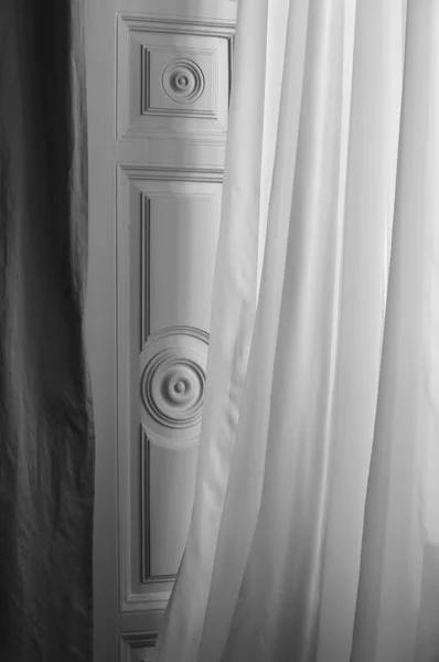 White curtain and wooden window door in black and white