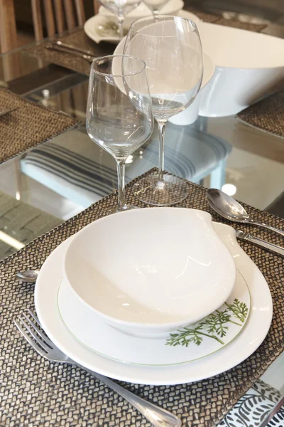 Crockery set over a table ready to be served