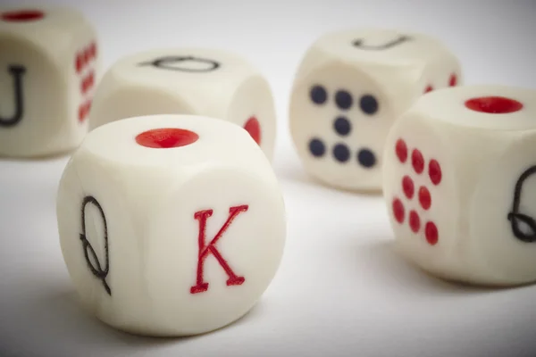 Dice poker game. Craps detail in white vignetting background