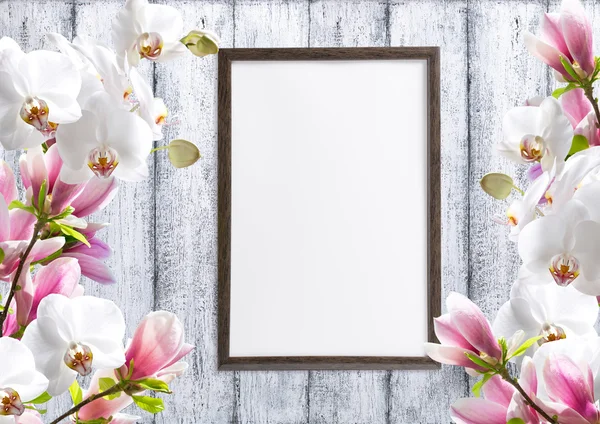 Magnolia flowers with orchidea and motivational frame