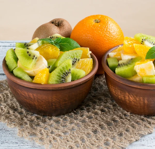 Fruit salad with kiwi, banana and orange