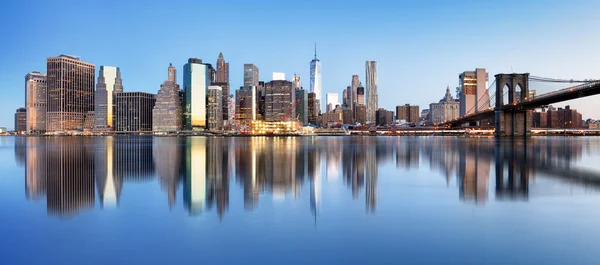 New York downtown panorama with brooklyn bridge and skyscrapers