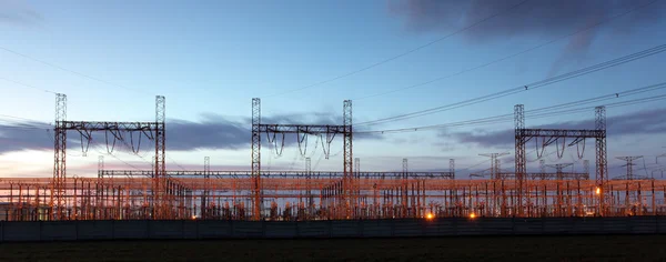 Distribution substation silhouetted against dusk sky ,electricit
