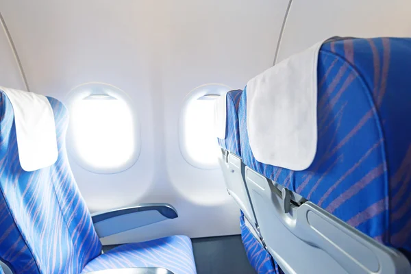 Empty aircraft seats and windows
