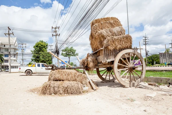 Carriage and straw