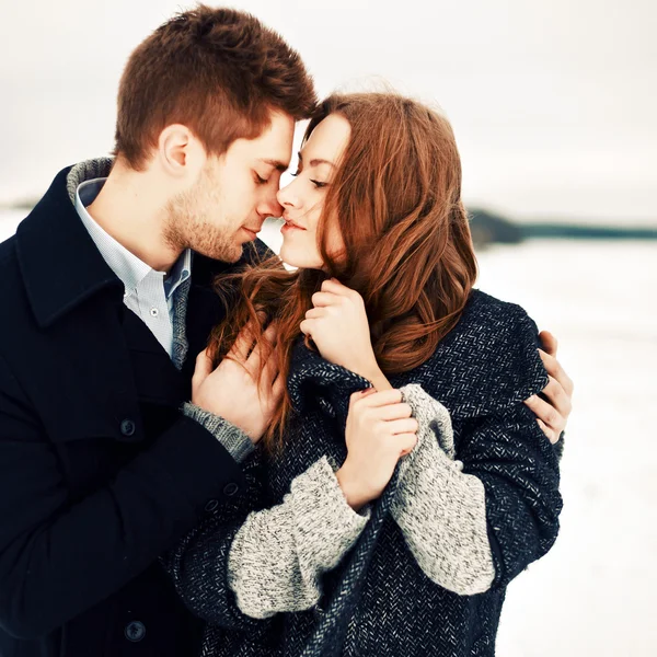 Young  couple in love in winter