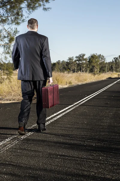 Frustrated businessman in the outback