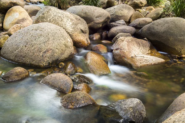 Rocks and flowing water