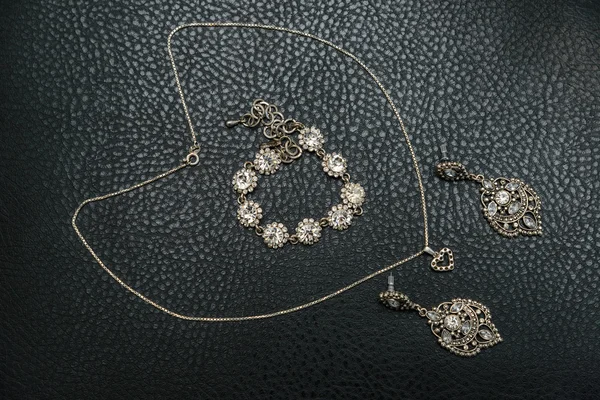 Set of silver jewelry from chains, rings and bracelet