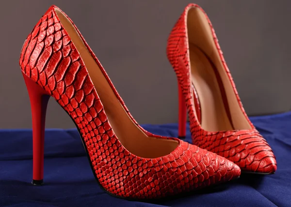 Red shoes of snakeskin