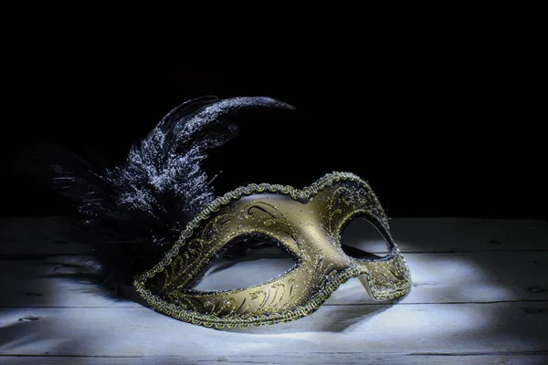 The Venetian mask with feather