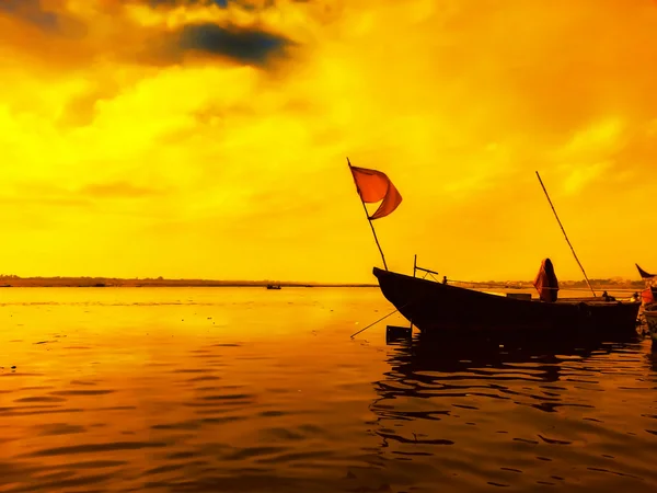 Boat sailor at sunset sunrise