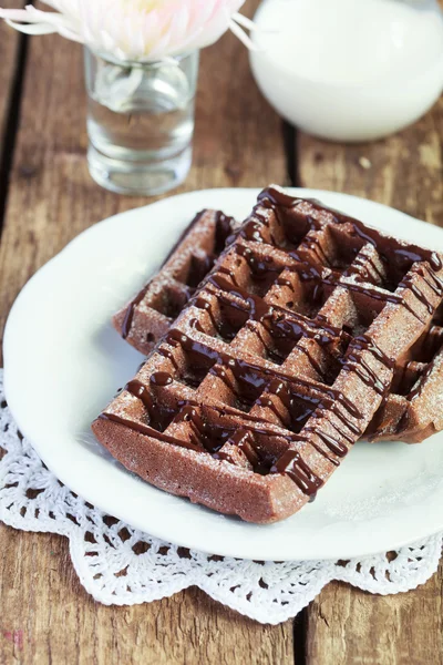 Homemade chocolate waffles with cocoa  from whole wheat flour, d