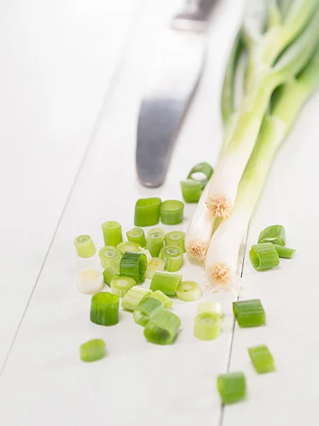 Spring onions on a tray