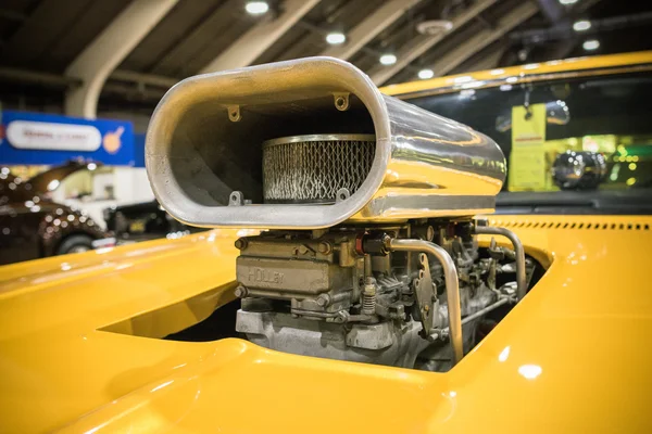 Customized muscle car engine displayed