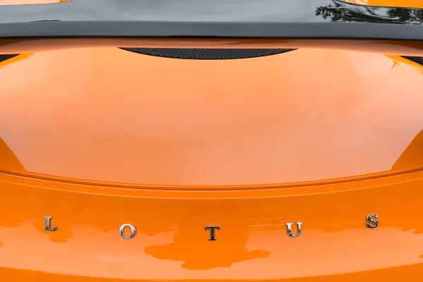 Orange Lotus logo on detail