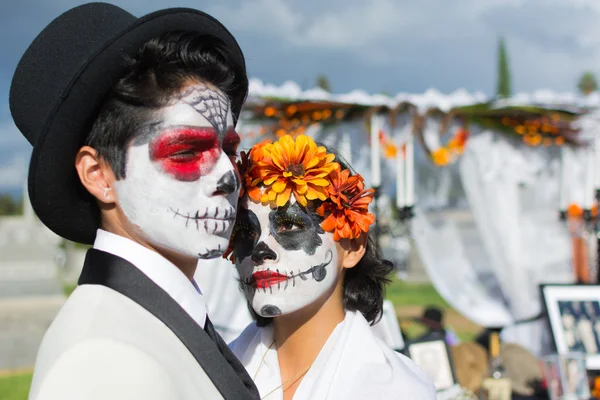 Unknown people and altar on display at the 15th annual Day of the Dead Festival