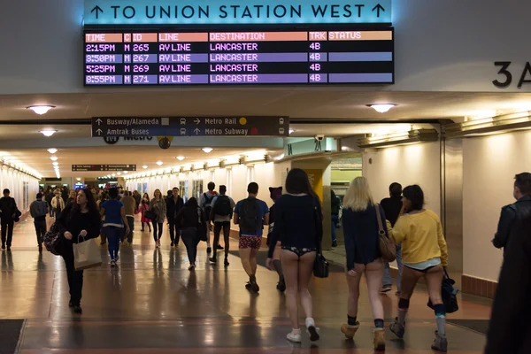 People without pants arriving in Union Station during the \