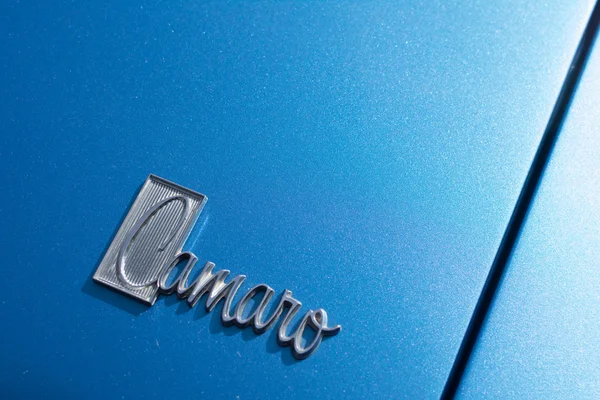 Chevrolet Camaro logo car on display