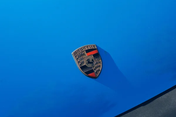 Porsche emblem on display